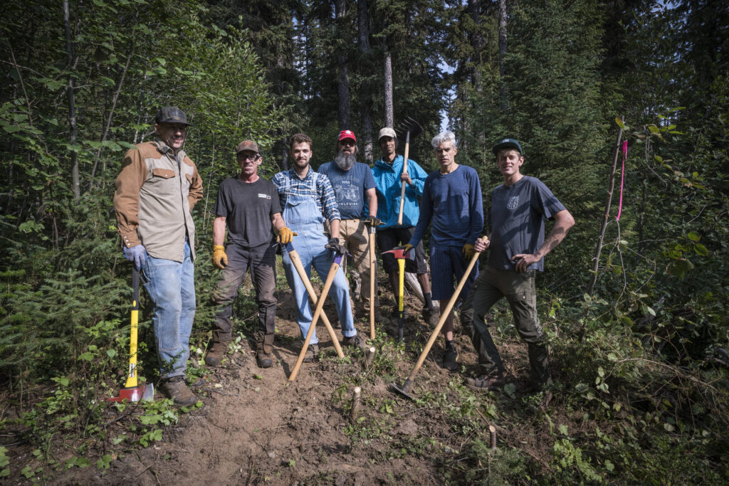 Members of the MBTA complete trail work at the 2022 MTB Tourism Symposium hosted at Silver Star Mountain Resort. 